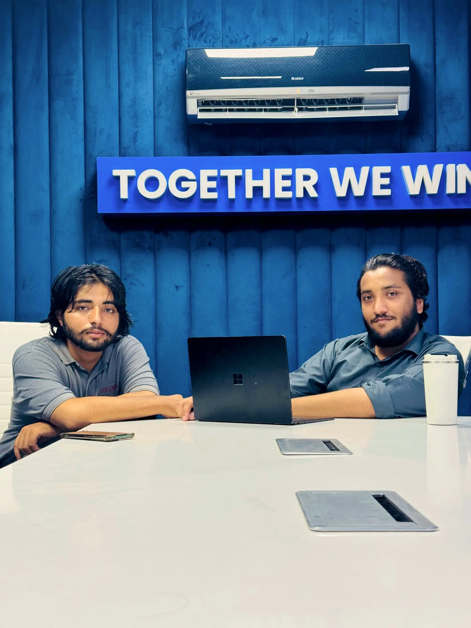 Two engineers at the meeting table