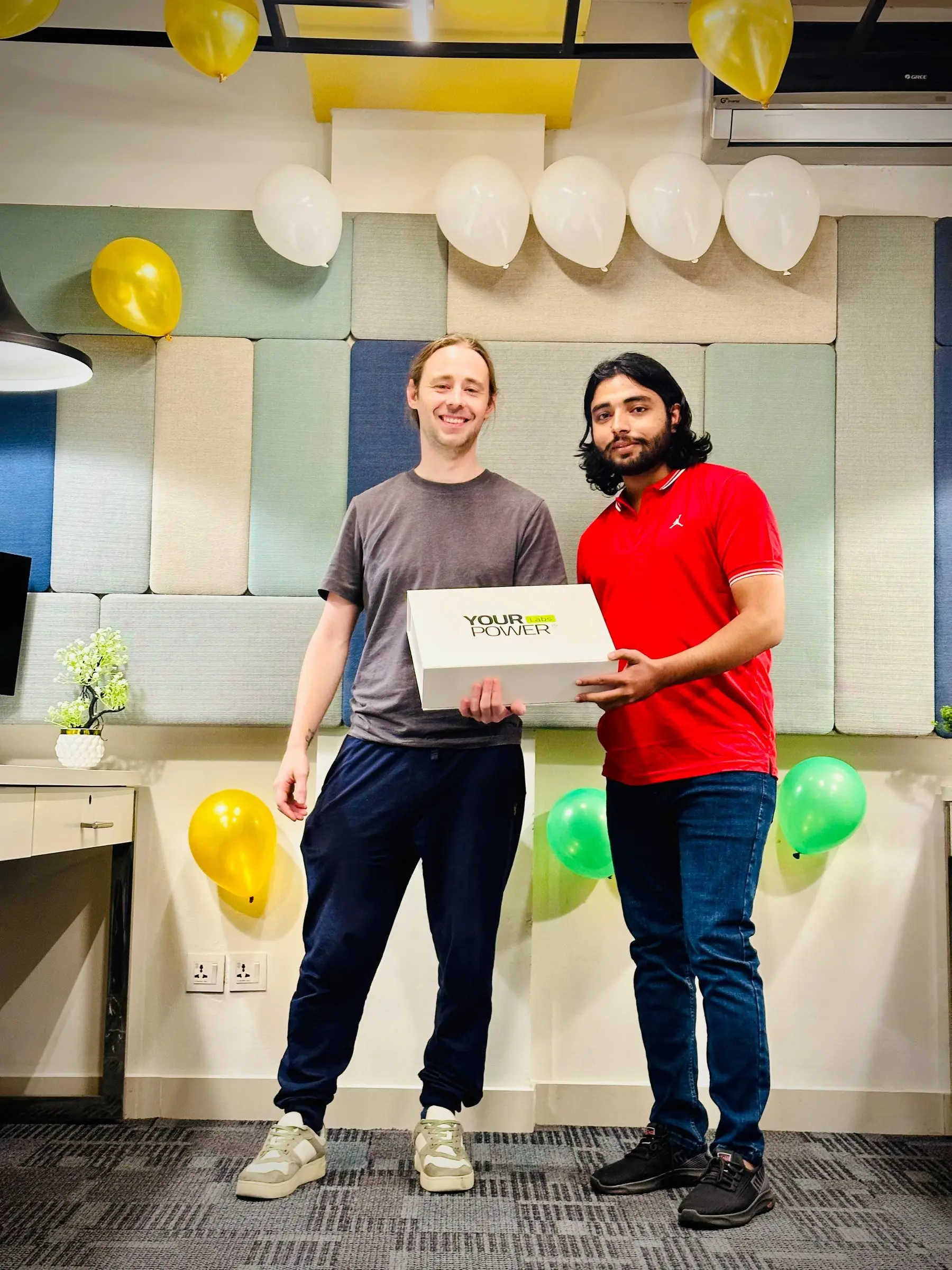 A new team member receiving a welcome gift