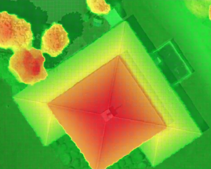 A digital surface model of a roof and its surroundings, coloured by height
